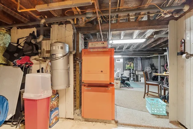 a view of a garage with a table and a chair