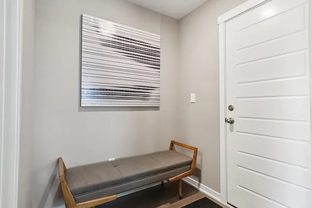 a room with a bed and a window