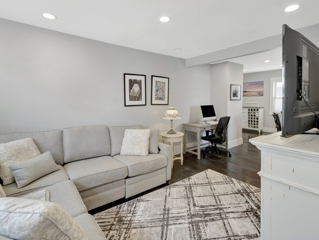 9 C Street Hull, MA 02045 - Photo 14 of 42 a living room with furniture and a flat screen tv