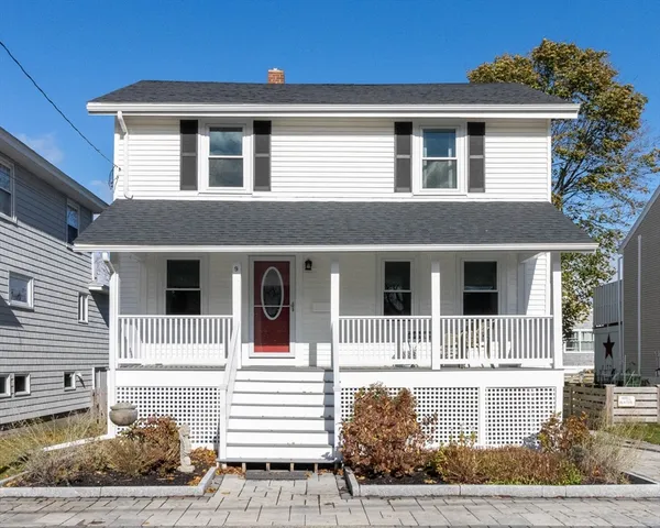 a front view of a house with a porch