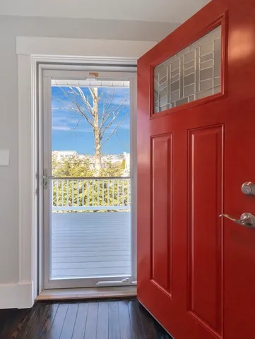 a front view of a house with a porch