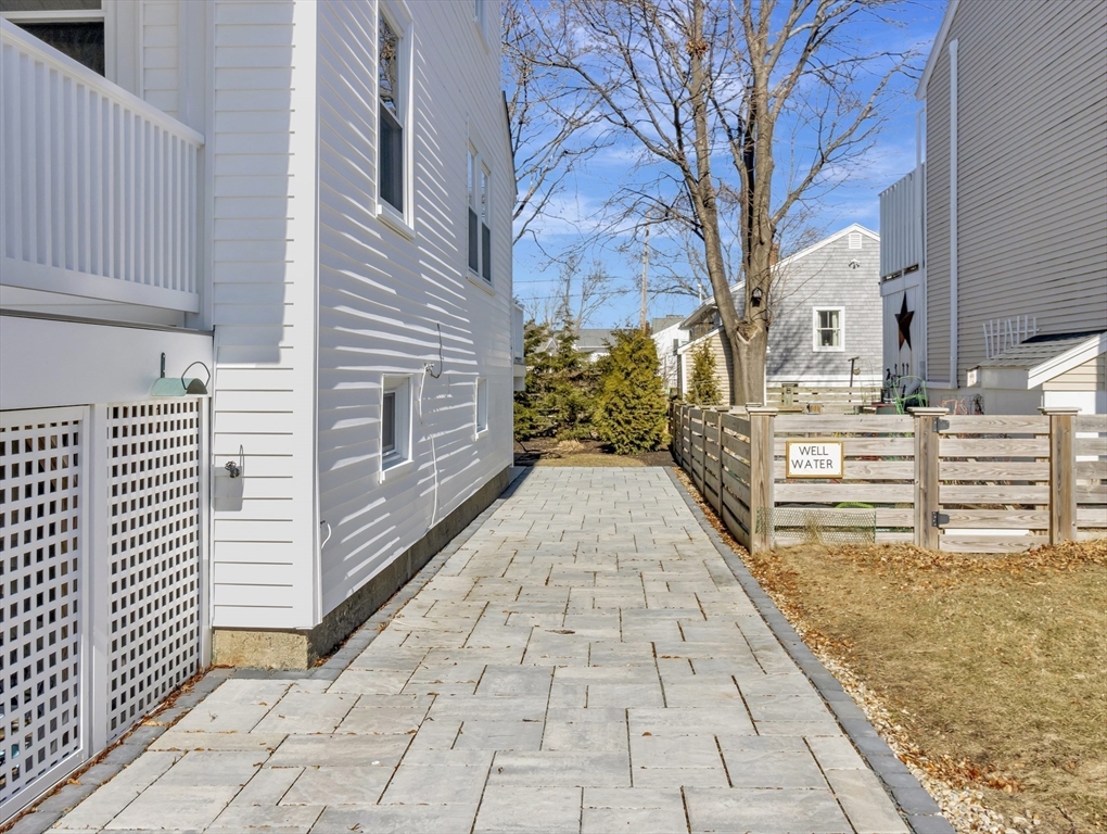 9 C Street Hull, MA 02045 - Photo 33 of 42 a view of a pathway along a building