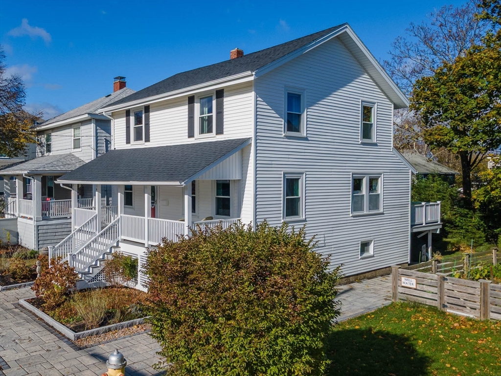 9 C Street Hull, MA 02045 - Photo 35 of 42 front view of a house with a yard