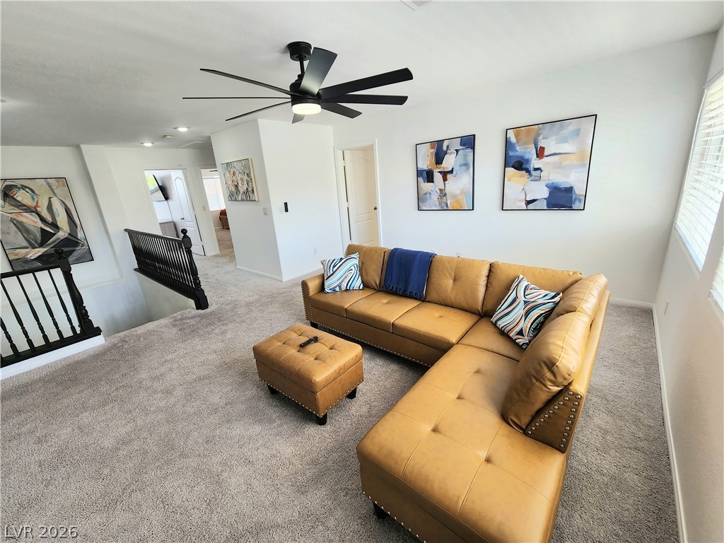 2743 Peekskill Avenue Henderson, NV 89052 - Photo 19 of 51 This inviting living area boasts plush carpeting and abundant natural light.