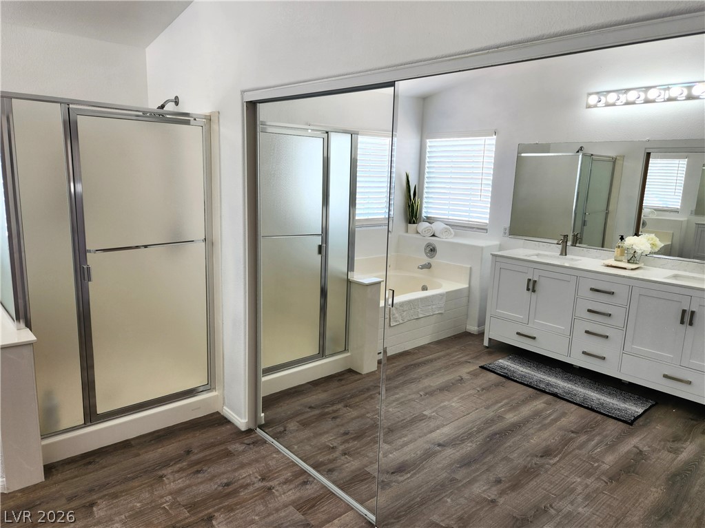 2743 Peekskill Avenue Henderson, NV 89052 - Photo 27 of 51 This spacious bathroom offers a relaxing soaking tub, a separate shower, and a stylish double vanity.