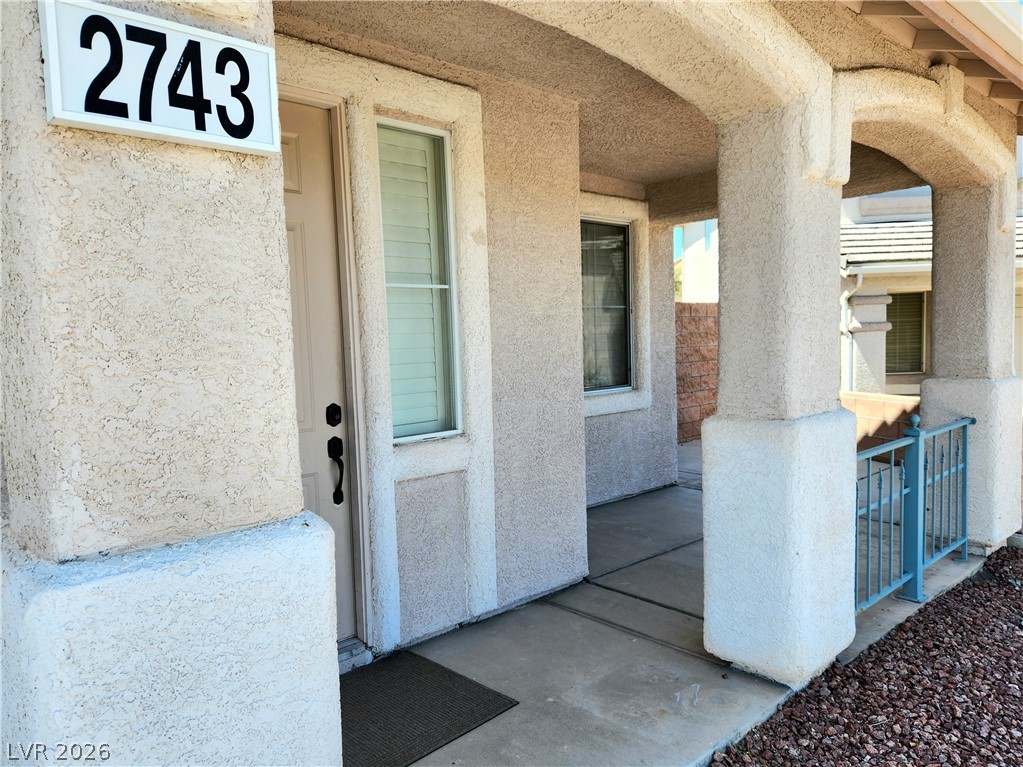 2743 Peekskill Avenue Henderson, NV 89052 - Photo 3 of 51 This inviting porch entry offers covered outdoor space, perfect for welcoming guests.
