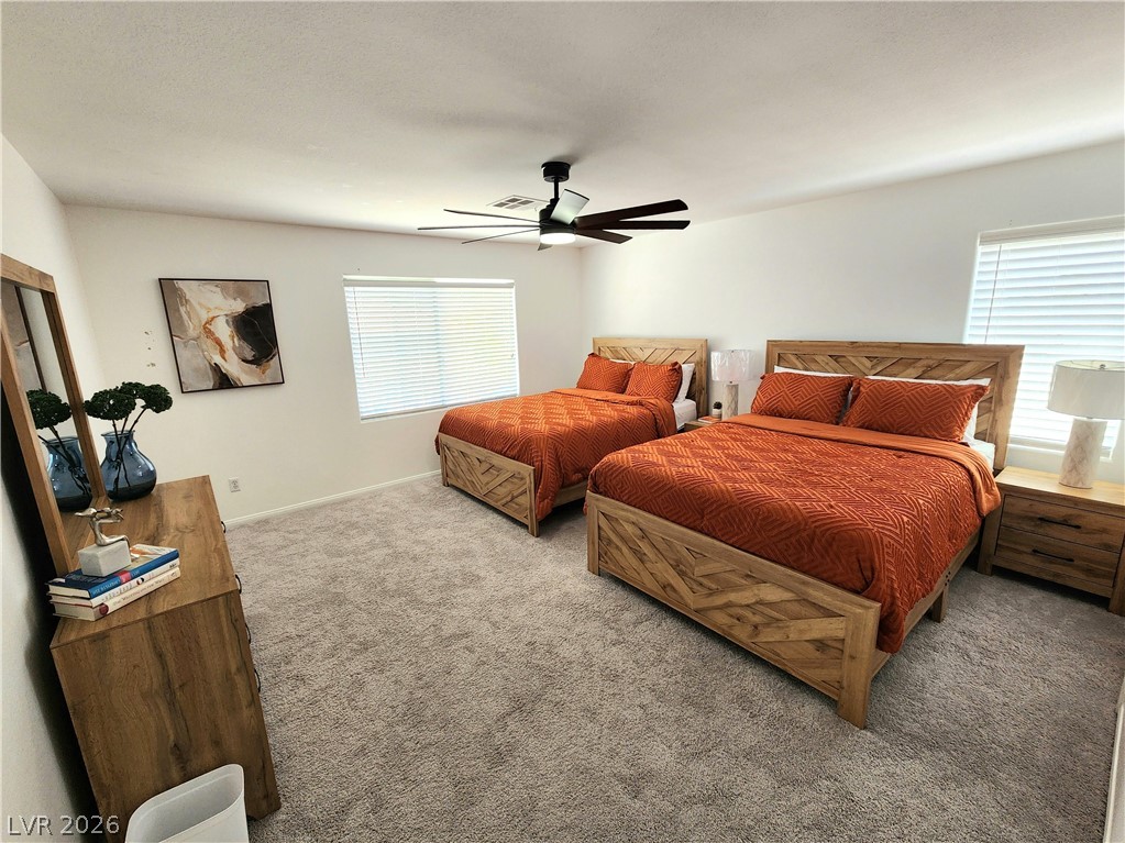 2743 Peekskill Avenue Henderson, NV 89052 - Photo 38 of 51 This inviting bedroom provides a comfortable and tranquil retreat.