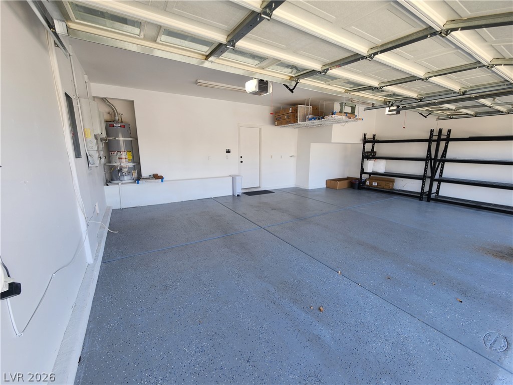 2743 Peekskill Avenue Henderson, NV 89052 - Photo 47 of 51 This spacious garage offers excellent storage solutions and a pristine epoxy floor.