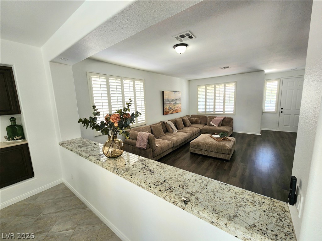 2743 Peekskill Avenue Henderson, NV 89052 - Photo 5 of 51 This inviting space features a charming pass-through window with granite counters.