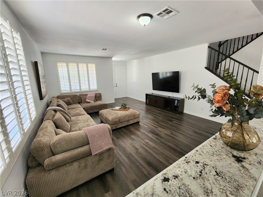 2743 Peekskill Avenue Henderson, NV 89052 - Photo 6 of 51 This inviting living space features elegant flooring and abundant natural light.