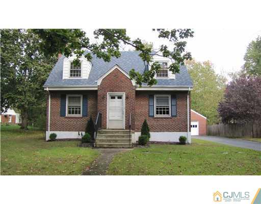 127 Washington Road Princeton, NJ 08540 - Photo 1 of 11 a front view of a house with a yard and trees