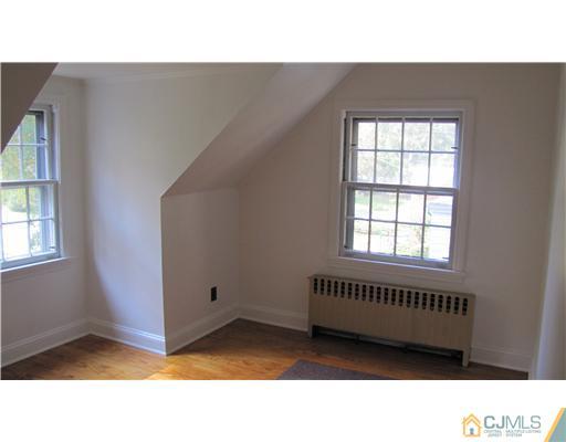 127 Washington Road Princeton, NJ 08540 - Photo 11 of 11 a kitchen with a window and a rug
