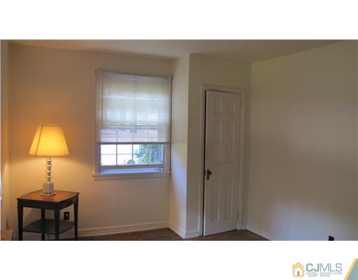 127 Washington Road Princeton, NJ 08540 - Photo 5 of 11 a black and white photo of a living room