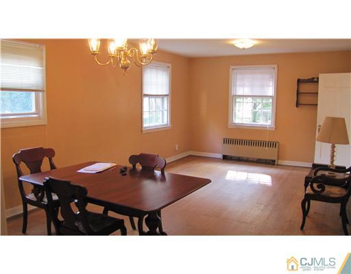 127 Washington Road Princeton, NJ 08540 - Photo 6 of 11 a kitchen with a dining table and chairs