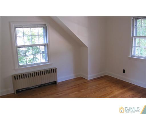 127 Washington Road Princeton, NJ 08540 - Photo 10 of 11 a kitchen with a window and a rug