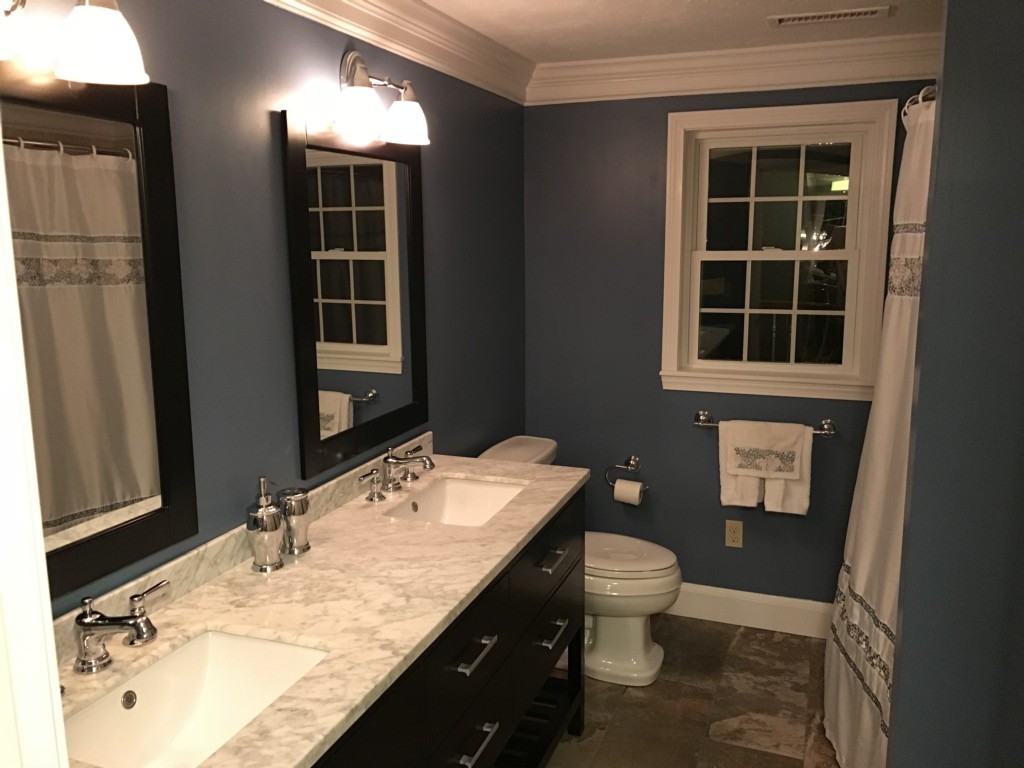 30 Brady Loop Andover, MA 01810 - Photo 10 of 12 a bathroom with a granite countertop sink toilet and mirror
