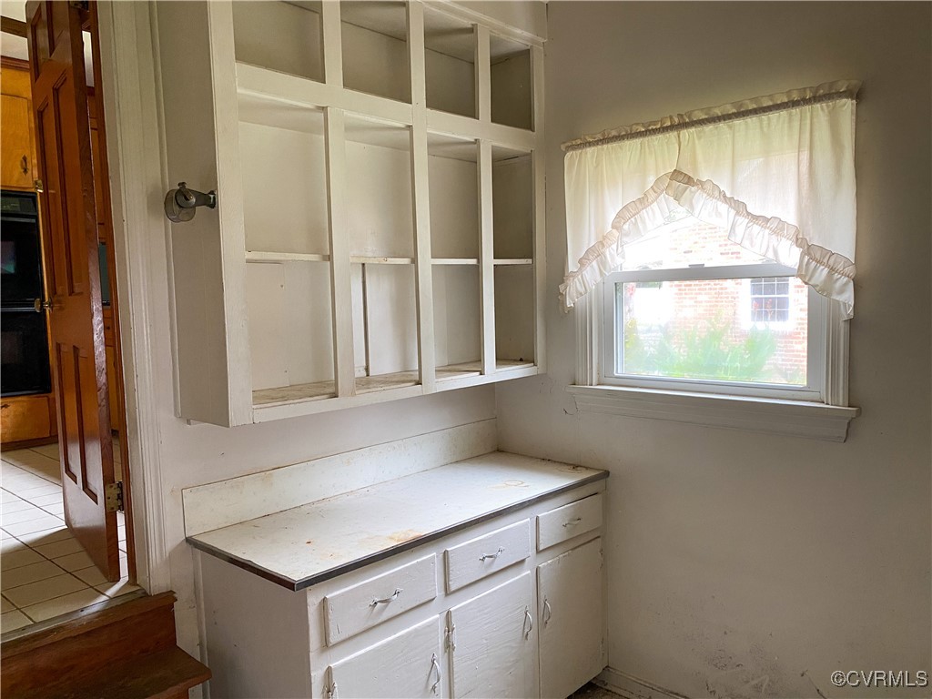 213 Jade Road Richmond, VA 23236 - Photo 13 of 33 a bathroom with a sink and a window
