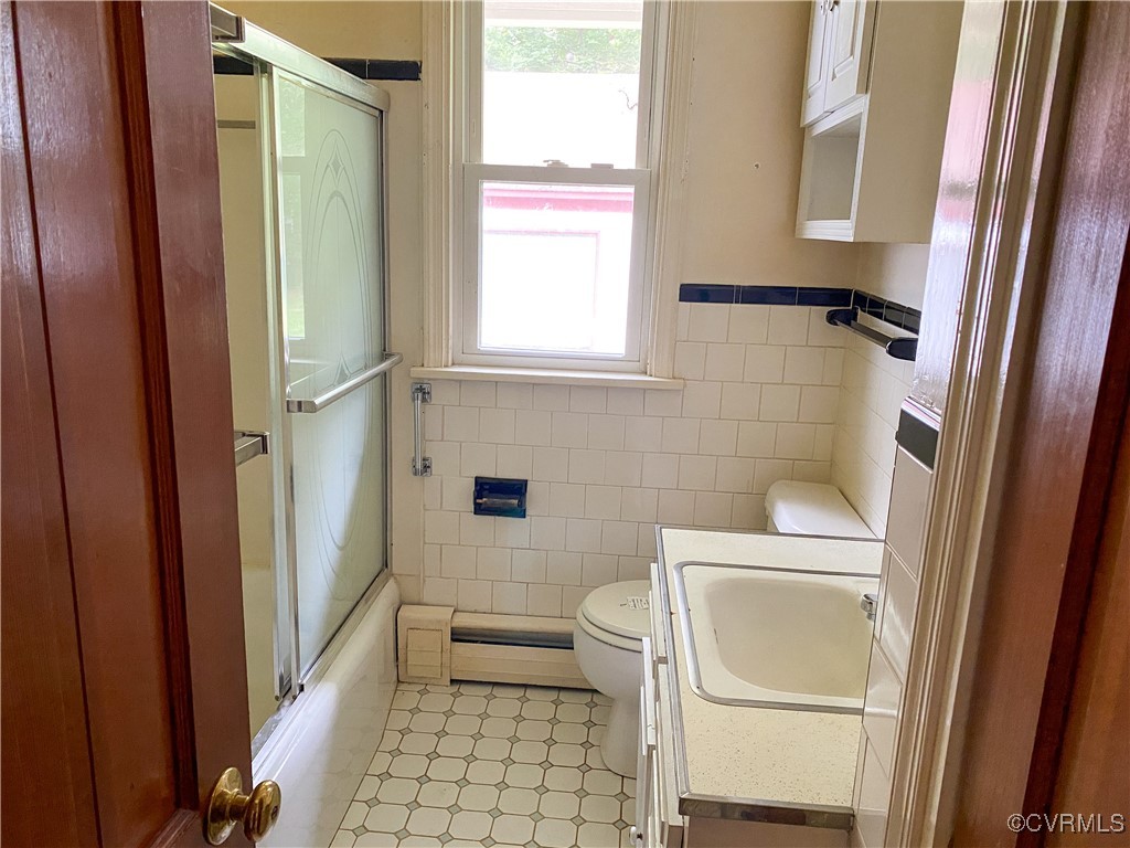 213 Jade Road Richmond, VA 23236 - Photo 14 of 33 a bathroom with a toilet and a shower