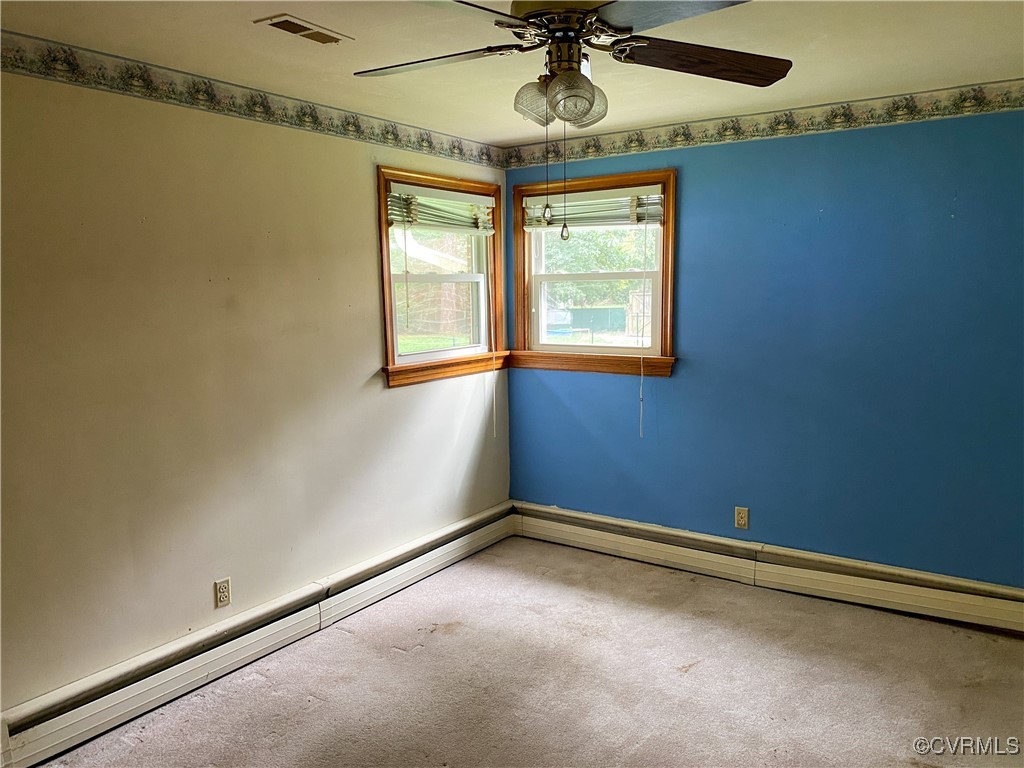 213 Jade Road Richmond, VA 23236 - Photo 16 of 33 a view of room with window and ceiling fan