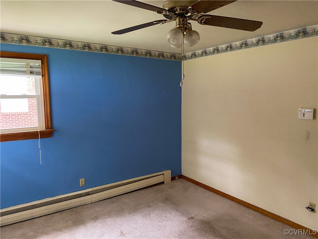 213 Jade Road Richmond, VA 23236 - Photo 17 of 33 a view of room with window and ceiling fan