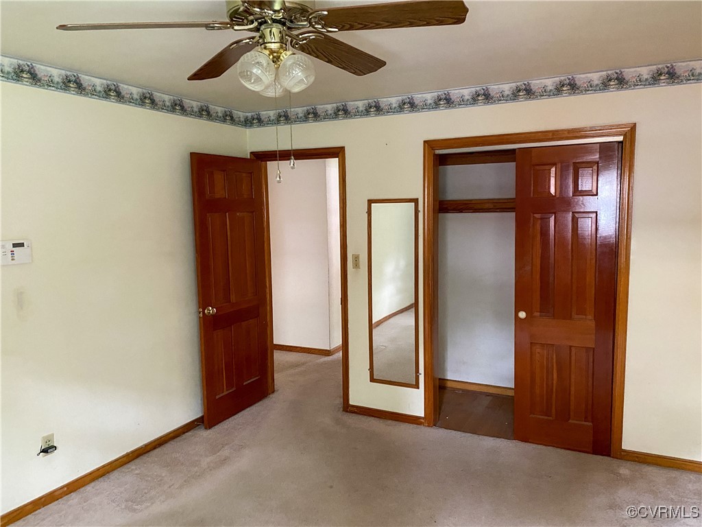 213 Jade Road Richmond, VA 23236 - Photo 18 of 33 an empty room with chandelier fan