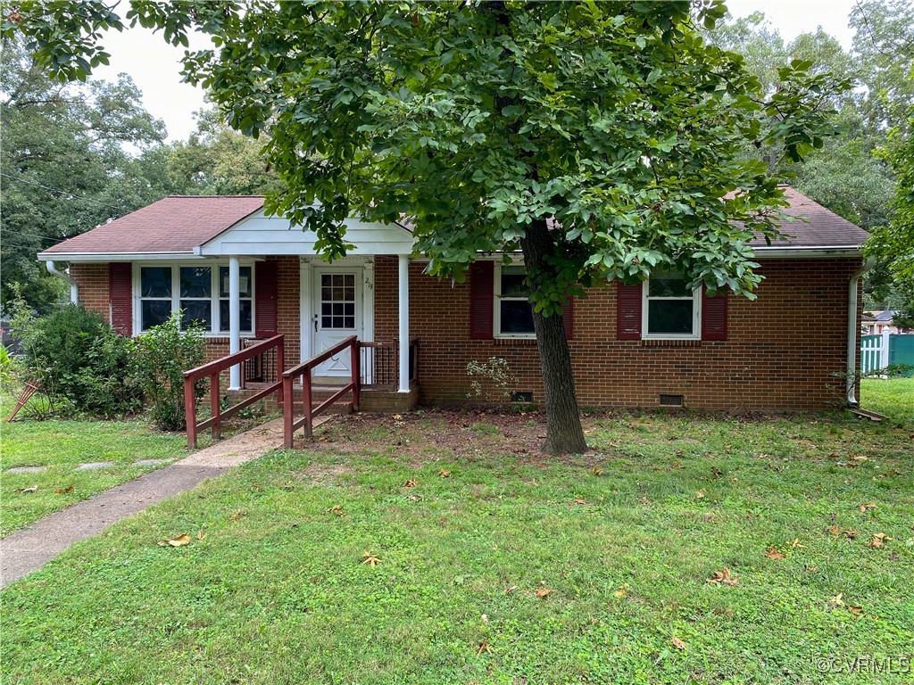 213 Jade Road Richmond, VA 23236 - Photo 2 of 33 front view of a house with a yard