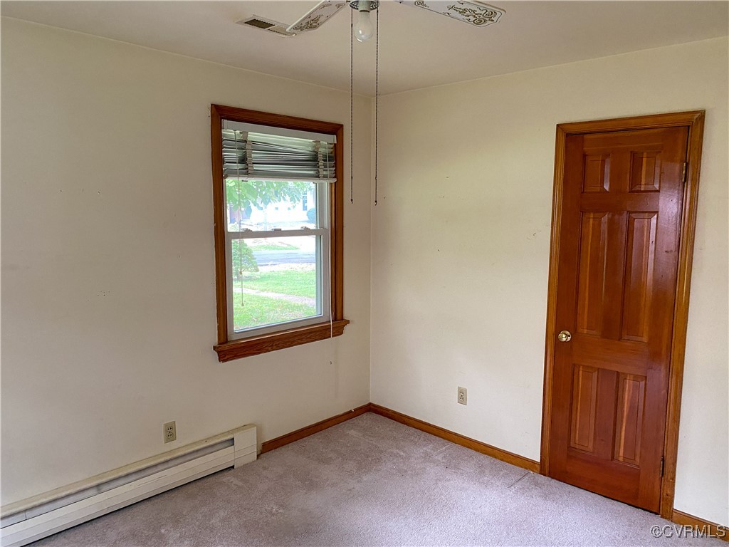 213 Jade Road Richmond, VA 23236 - Photo 21 of 33 an empty room with windows and closet