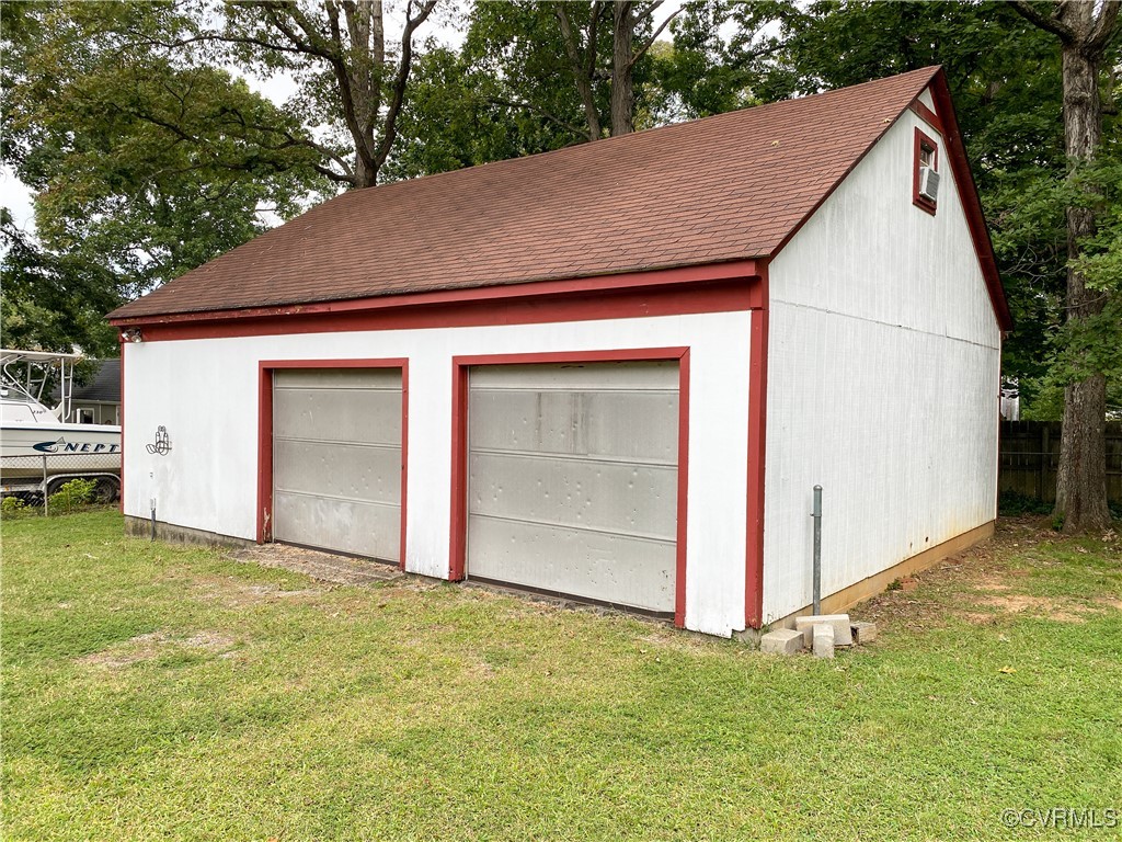 213 Jade Road Richmond, VA 23236 - Photo 27 of 33 a view of backyard with garage