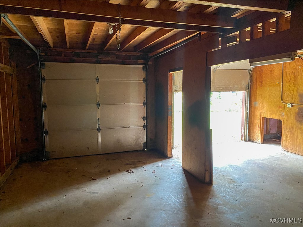 213 Jade Road Richmond, VA 23236 - Photo 33 of 33 a view of an empty room with wooden floor and a window