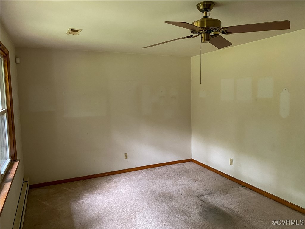 213 Jade Road Richmond, VA 23236 - Photo 4 of 33 a view of a small space with a fan