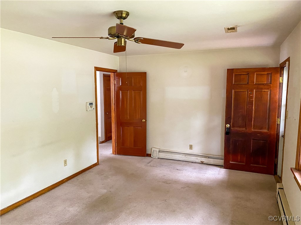213 Jade Road Richmond, VA 23236 - Photo 7 of 33 a view of empty room with ceiling fan