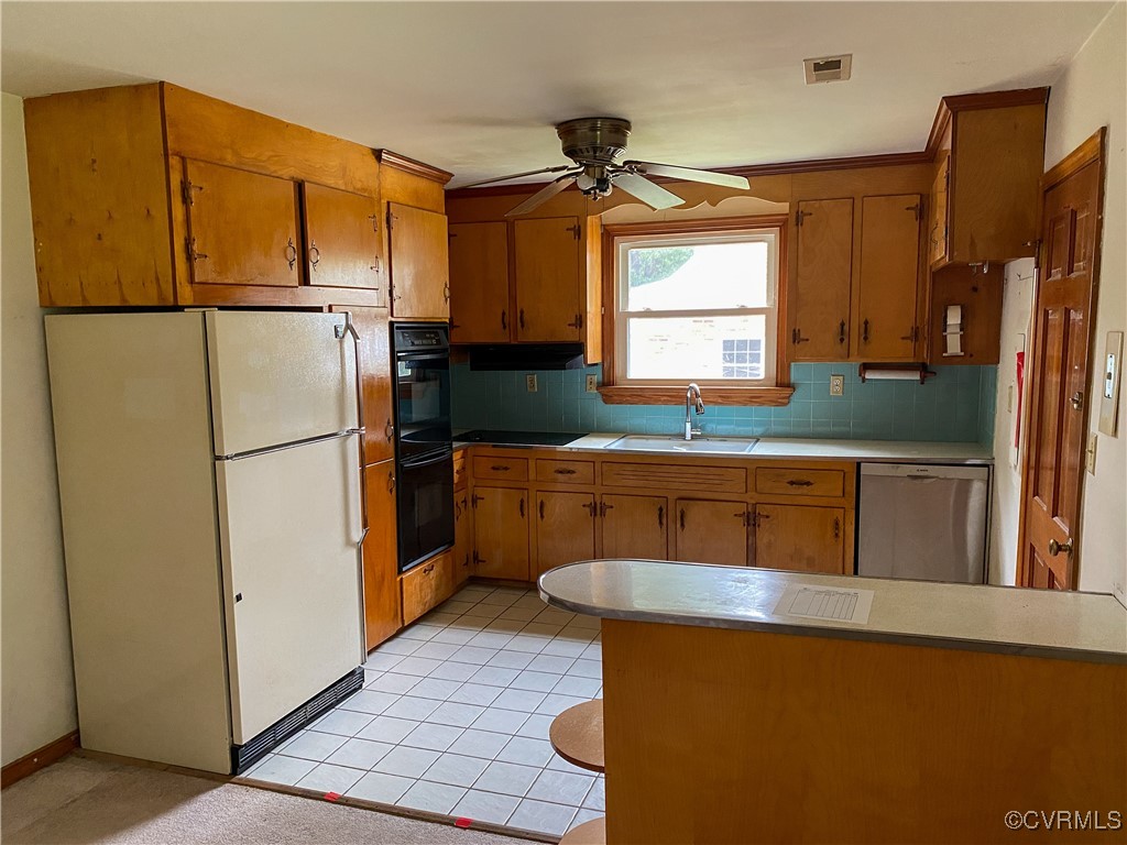 213 Jade Road Richmond, VA 23236 - Photo 9 of 33 a kitchen with stainless steel appliances granite countertop a refrigerator a stove a sink and a refrigerator