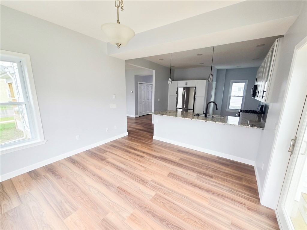 30 Evans Street Auburn, NY 13021 - Photo 9 of 24 Eat in area to kitchen
