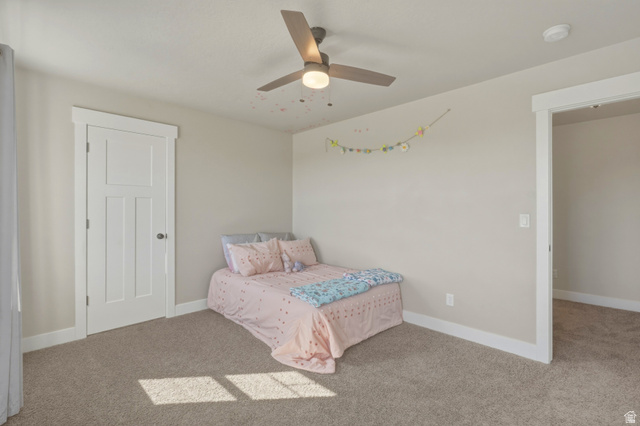 836 South 250 West Vernal, UT 84078 - Photo 38 of 56 Carpeted bedroom with baseboards and ceiling fan