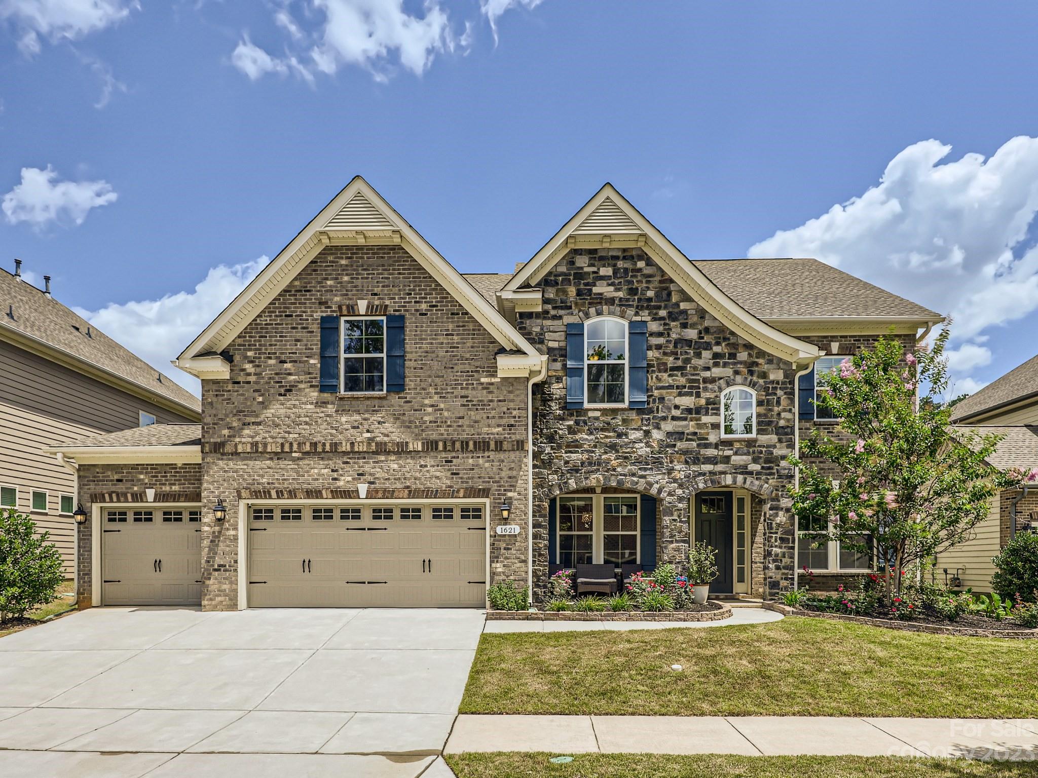 1621 Afton Way Fort Mill, SC 29708 - Photo 1 of 1 a front view of a house with a yard