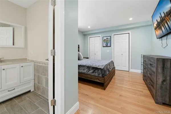 a bathroom with a toilet sink and shower