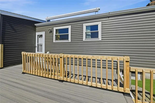 a kitchen with a white cabinets and white appliances
