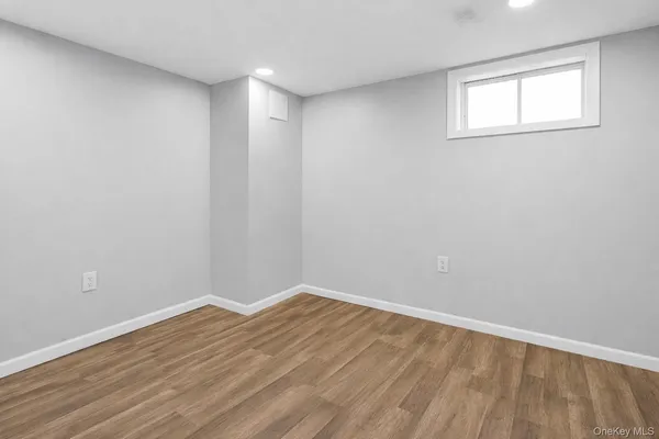 a view of kitchen and wooden floor