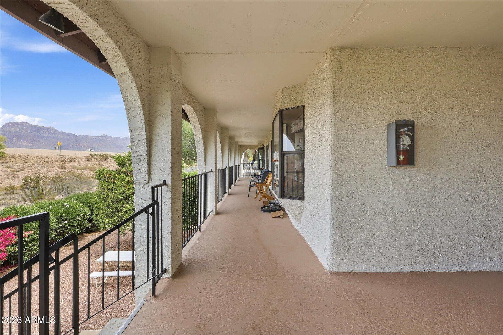 3270 South Goldfield Road, Unit 716 Apache Junction, AZ 85119 - Photo 7 of 36 a view of a city from a balcony