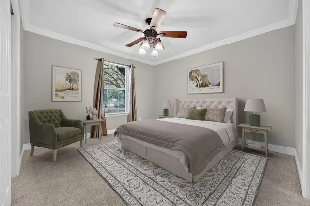 a bed room with a bed and a couch