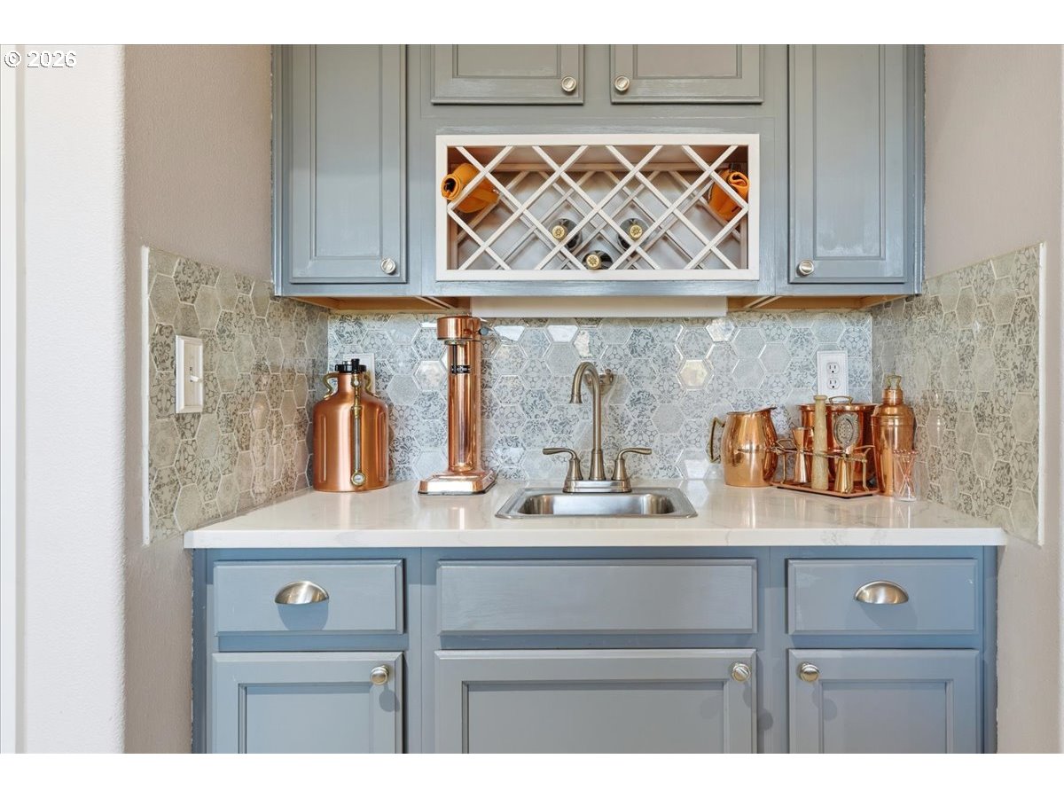 21601 Northeast Willow Glen Road Fairview, OR 97024 - Photo 11 of 48 a bathroom with a sink and a white cabinets