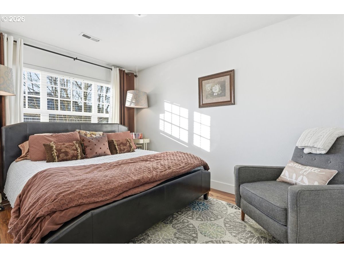 21601 Northeast Willow Glen Road Fairview, OR 97024 - Photo 29 of 48 a bedroom with a bed and a couch