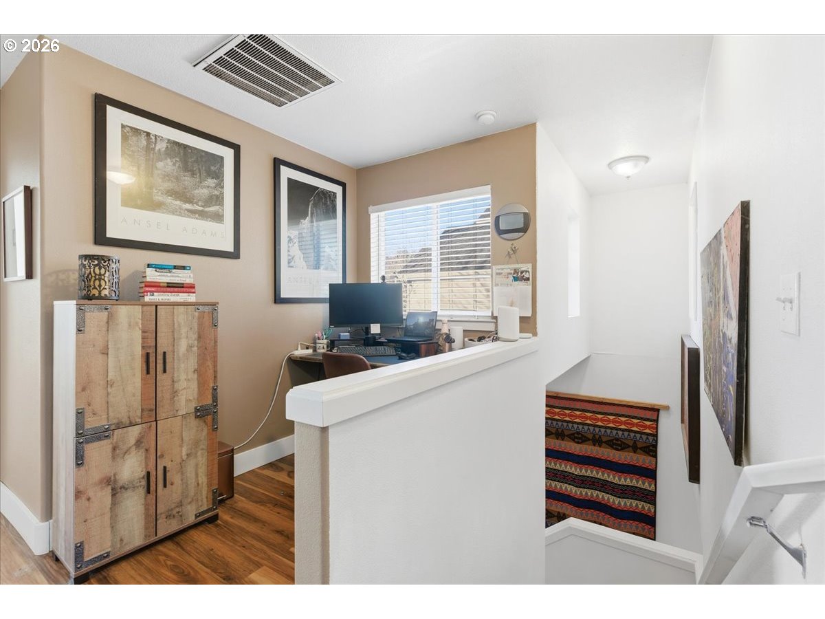 21601 Northeast Willow Glen Road Fairview, OR 97024 - Photo 35 of 48 a kitchen with a refrigerator and a stove top oven
