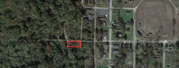 a view of a bathroom with a shower and sink