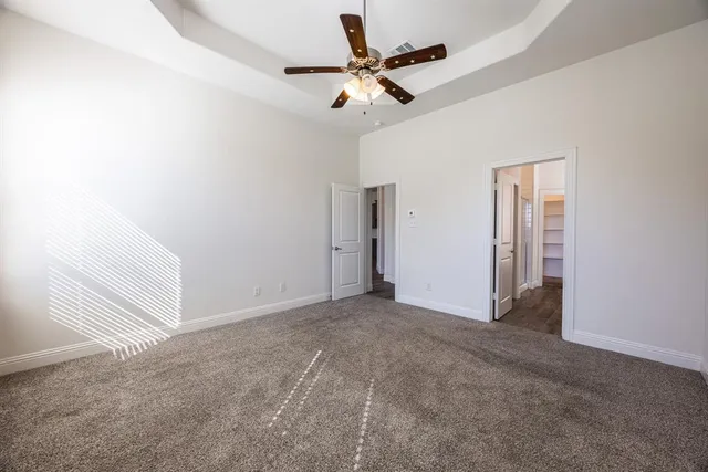 a view of a livingroom with a ceiling fan