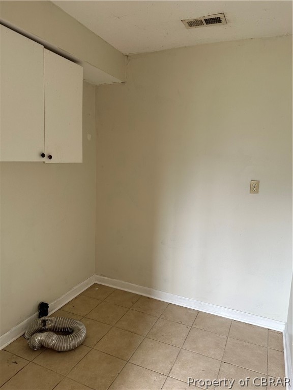 2391 Bethal Beach Road Onemo, VA 23130 - Photo 28 of 29 Laundry area featuring light tile floors