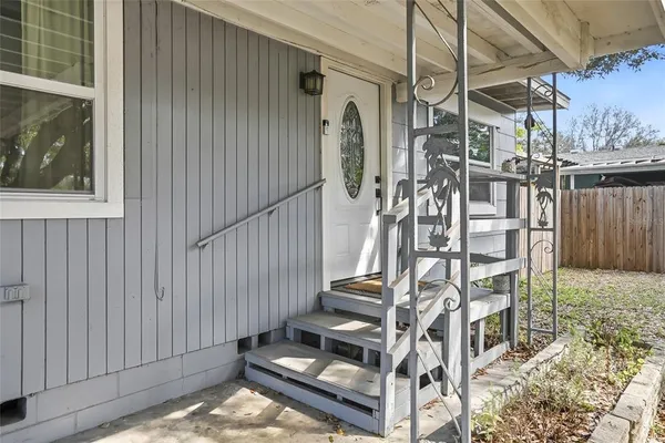 a view of entryway with wooden floor