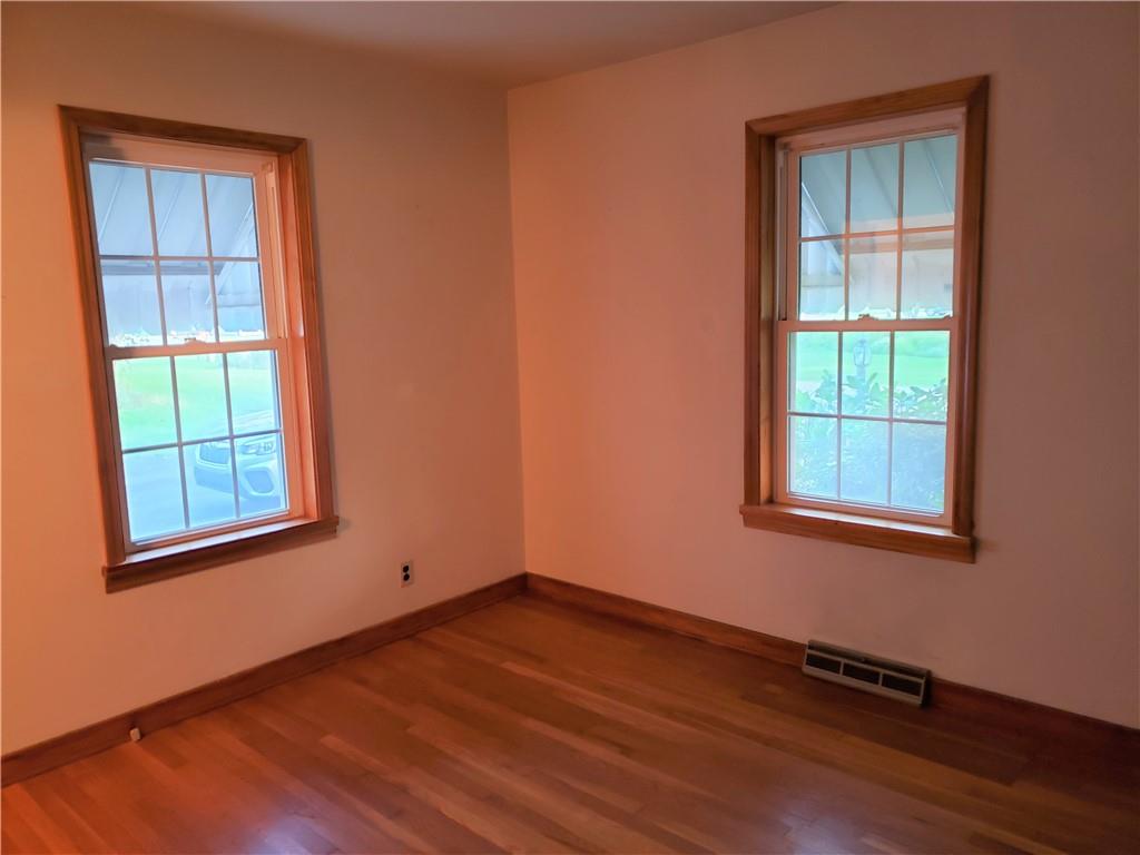 2256 Bethel Church Road Indiana, PA 15701 - Photo 14 of 25 an empty room with wooden floor and windows