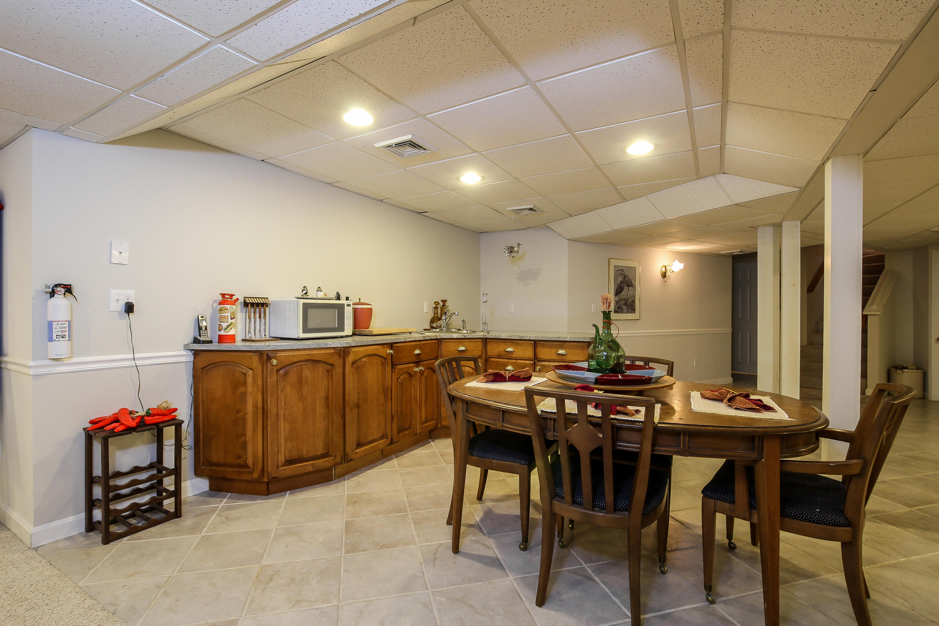 494 Elliott Road Centerville, MA 02632 - Photo 22 of 31 a view of a dining room with furniture