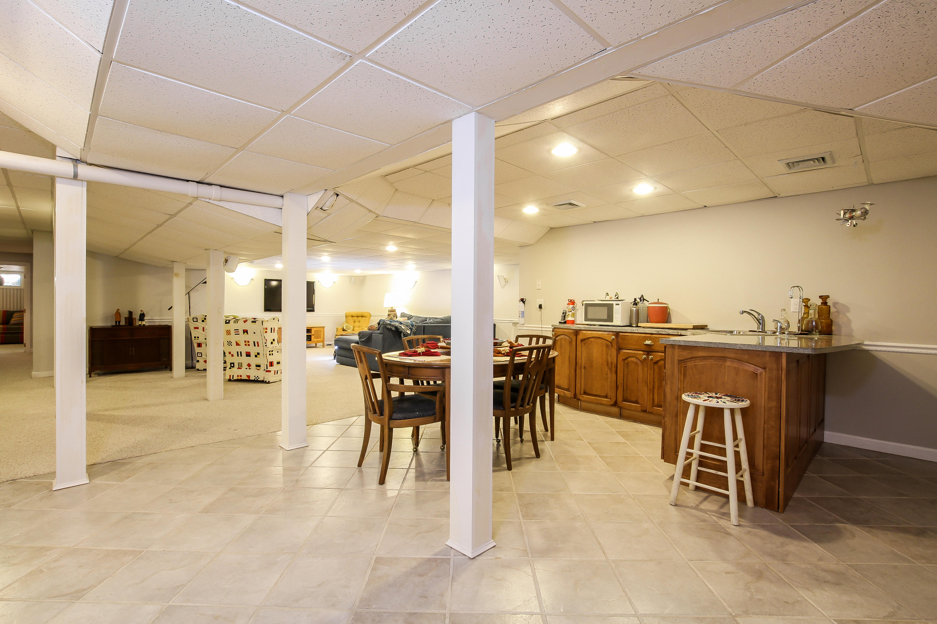 494 Elliott Road Centerville, MA 02632 - Photo 23 of 31 a view of a dining room with furniture
